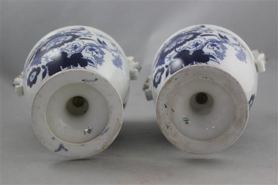 A pair of Copeland blue and white bone china oviform vases and covers, late 19th century, 30cm